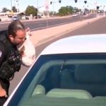 watch:-police-pull-over-drivers-to-surprise-them-with-free-turkeys,-brings-one-man-to-tears