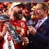 chiefs’-travis-kelce-belts-out-‘viva-las-vegas’-with-taylor-swift-watching-after-super-bowl-win