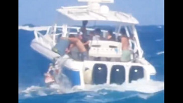 busted:-party-people-on-boat-in-florida-caught-on-camera-dumping-cans-of-garbage-into-the-ocean-(video)